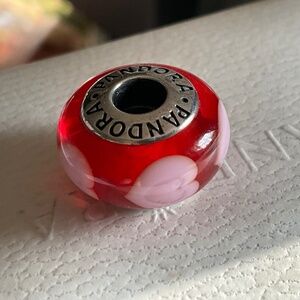 Pandora red glass charm with pink hearts